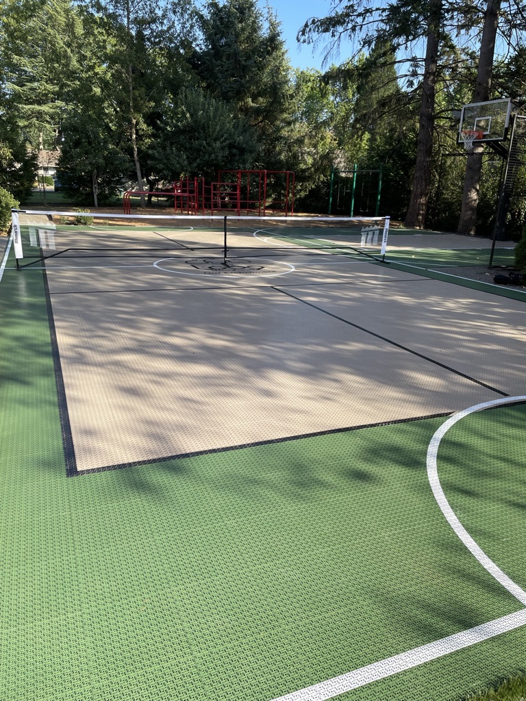 Gallery of backyard court and home gym installations featuring SnapSports